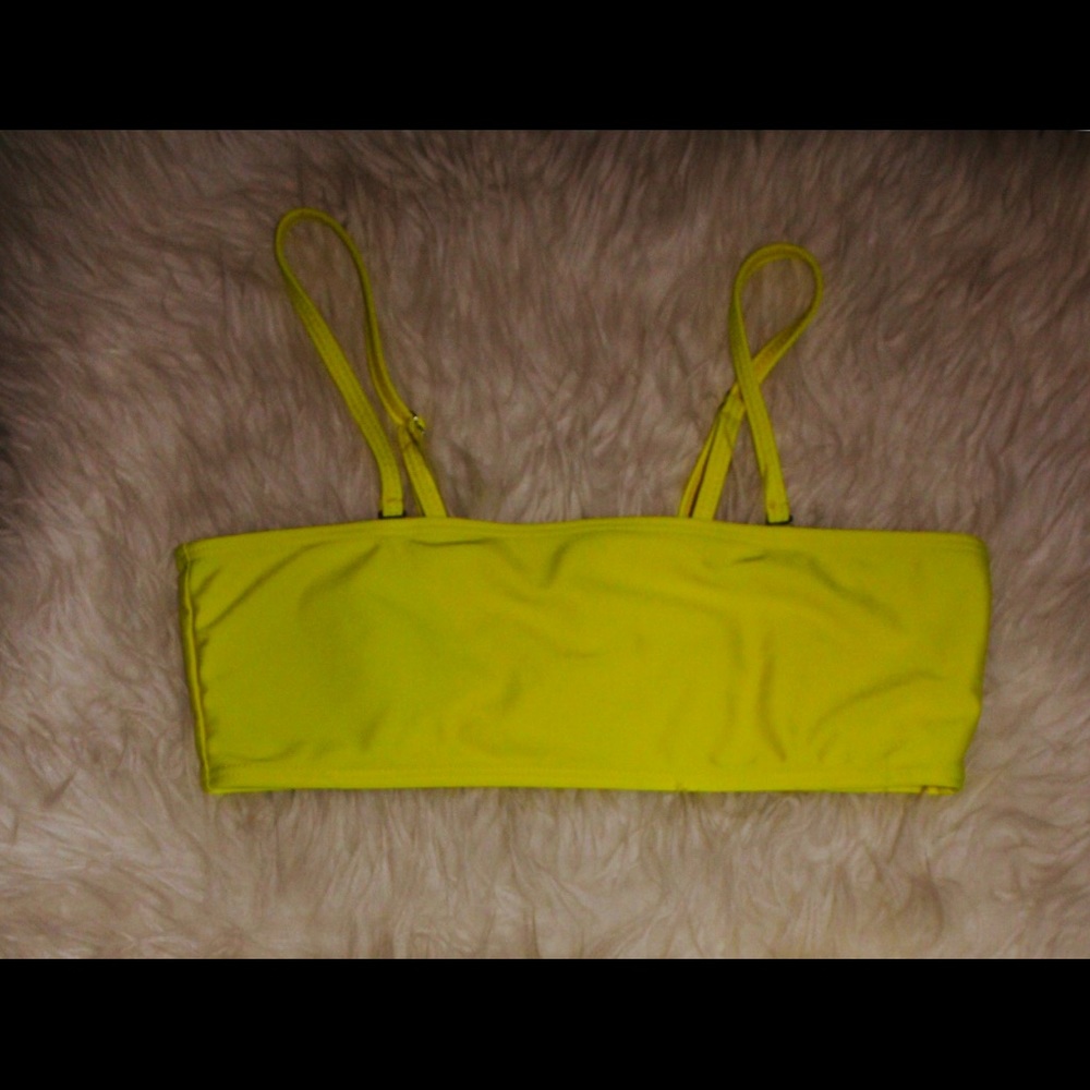 A neon yellow bikini top and cheeky bottom